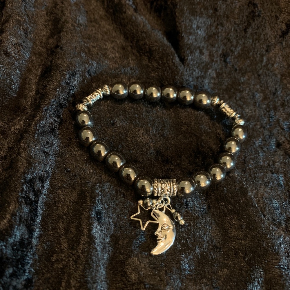 Genuine hematite bracelet with dangling charms